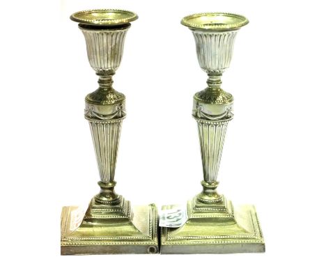 Pair of hallmarked silver weighted candlesticks, London assay, maker TB, H: 17 cm. P&amp;P Group 2 (£18+VAT for the first lot