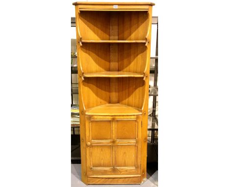 Ercol elm corner shelves with cupboard below. Not available for in-house P&amp;P 