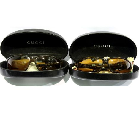 Two boxed pairs of ladies Gucci sunglasses. P&amp;P Group 1 (£14+VAT for the first lot and £1+VAT for subsequent lots) 