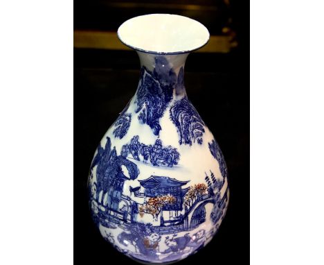 Chinese blue and white baluster vase with applied brown decoration with character marks to the base, H: 26 cm. P&P Group 3 (£