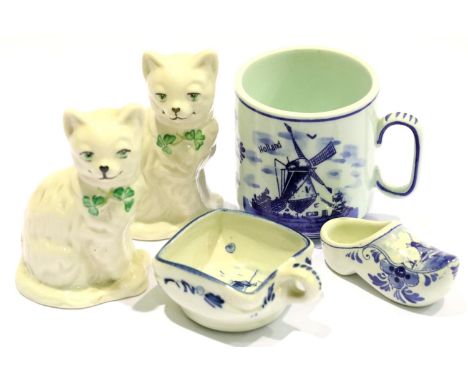 Two Belleek cats and three pieces of Dutch Delftware. P&amp;P Group 3 (£25+VAT for the first lot and £5+VAT for subsequent lo