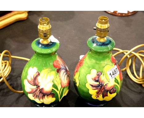 Pair of Moorcroft coral ground Hibiscus lamps, H: 28 cm. P&P Group 3 (£25+VAT for the first lot and £5+VAT for subsequent lot