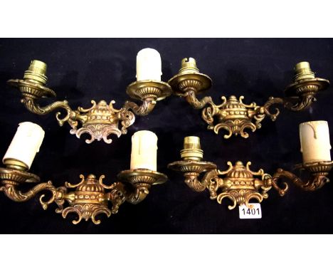 Four vintage brass double wall sconces. P&amp;P Group 3 (£25+VAT for the first lot and £5+VAT for subsequent lots) 
