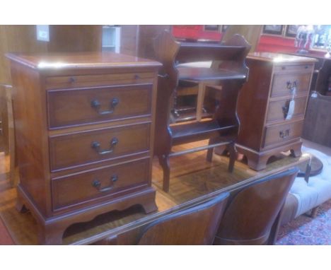 A pair of 20th century yew wood side chests, with brush slide, over three drawers, raised on bracket feet, H.63 W.48 D.34cm 