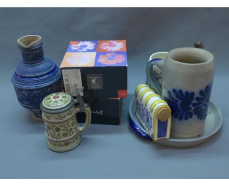 A collection of pottery and ceramics, to include a blue and white pottery jug, a Gres de la Roche dish, a tankard, two boxed 