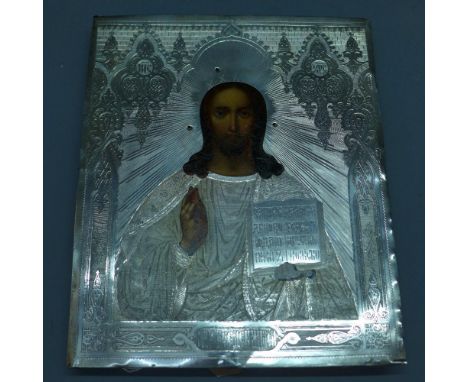 A Russian icon, Christ Pantokrator, tempera on wood panel with silver oklad, hallmarked, 27 x 22cm 
