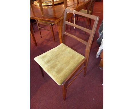 A set of four G-plan teak ladder back dining chairs 