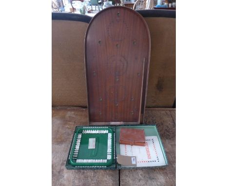 A Bagatelle board, together with a Bettabridge set, a Bridge set comprising two decks of cards, pencils, and 'The Laws of Con