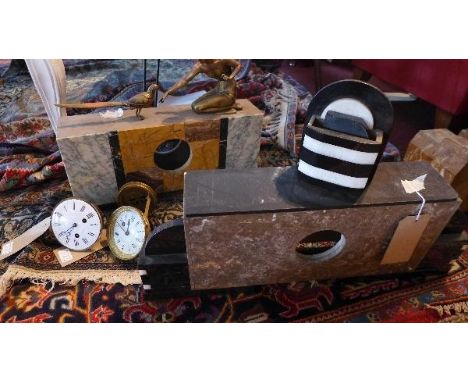 An Art Deco marble mantel clock case with gilt metal finial in form of a lady kneeling to feed a bird (no movement), together