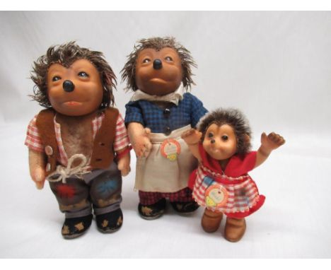 Three Steiff hedgehog family members including Micki, Mucki, and Necki, two with original Steiff wristbands and two with orig