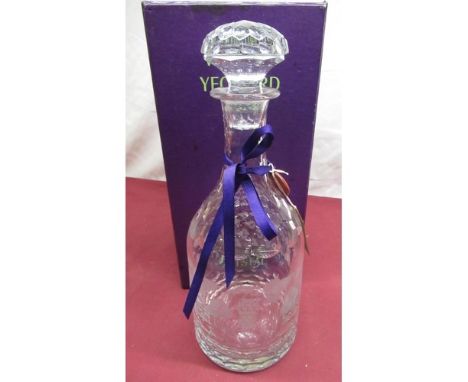 William Yeoward crystal decanter, mallet shaped body decorated with grapes, facetted neck and stopper with ribbon tied seal i
