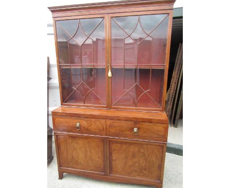 Geo. IV mahogany secretaire bookcase with moulded cornice above a pair of astragal glazed doors and three adjustable shelves,