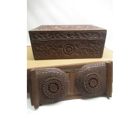 C20th carved padauk wood stationery box, the top extensively carved with a peacock and meandering foliage and a c20th century