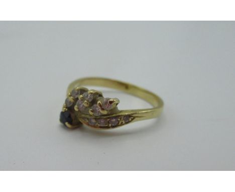 18ct gold ring with sapphire and white stones set in petal shaped mounts size K 1/2 2.3g 