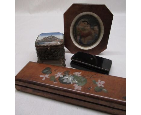 C19th Continental oil on ivory depicting the Madonna and child, in walnut and mother of pearl frame, C19th ebonised papier ma