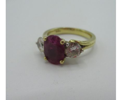 18ct gold diamond and ruby ring stamped DIA 104, 750  Size N 5.4g 