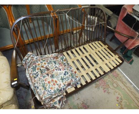 AN ERCOL COTTAGE STYLE SOFA FRAME