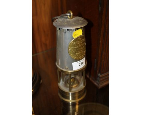 A VINTAGE 'THE PROTECTOR' MINERS LAMP