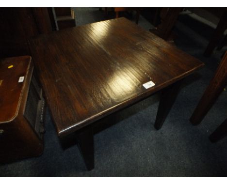 A LOW DARK OAK LAMP TABLE