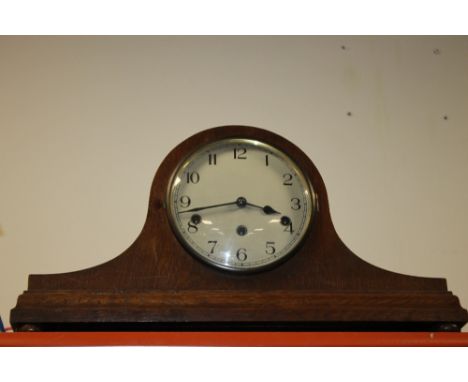 A LARGE NAPOLEON HAT MANTLE CLOCK