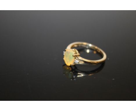 A LADIES 9CT GOLD OPAL AND DIAMOND SET DRESS RING