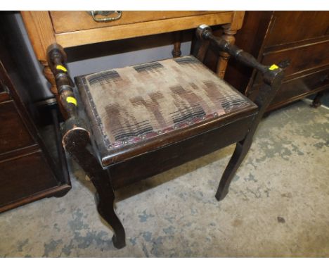 AN EDWARDIAN PIANO STOOL