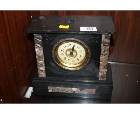 AN ANTIQUE SLATE MANTEL CLOCK