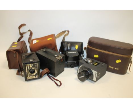 A COLLECTION OF ASSORTED VINTAGE CAMERAS TO INCLUDE A BROWNIE, FEATURE CINE CAMERA ETC..