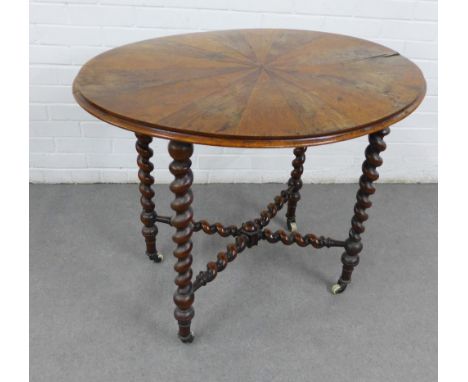 19th century table, with an oval top with starburst veneers, on bobbin legs and stretcher, ceramic castors, (a/f) 76 x 93cm