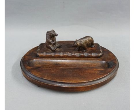 Black Forest style carved wooden bear desk inkwell with pen tray, 24cm 