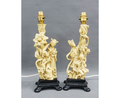 A pair of chinoiserie faux ivory moulded resin figural table lamp bases with shades, size excluding fitting 32cm (2) 