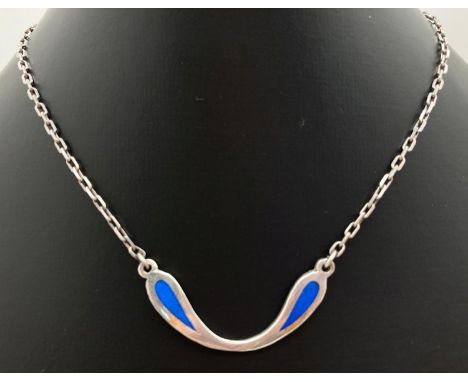 A contemporary design silver fixed pendant necklace with blue enamel detail and squared belcher chain. Chain fixings marked 9