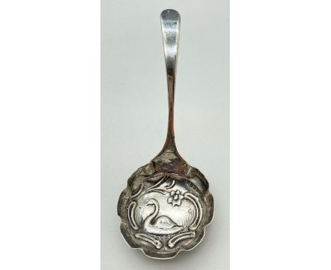 A Victorian Dutch silver ladle with embossed swan decoration to bowl. Hallmarked to back of handle with import marks for Lond