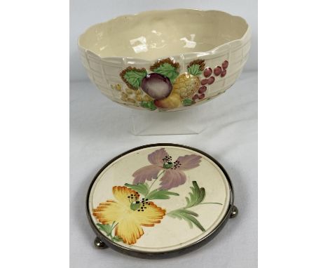 2 pieces of Art Deco hand painted ceramics. A Coronet Ware Parrot &amp; Company, Burslem teapot stand together with an AJ Wil