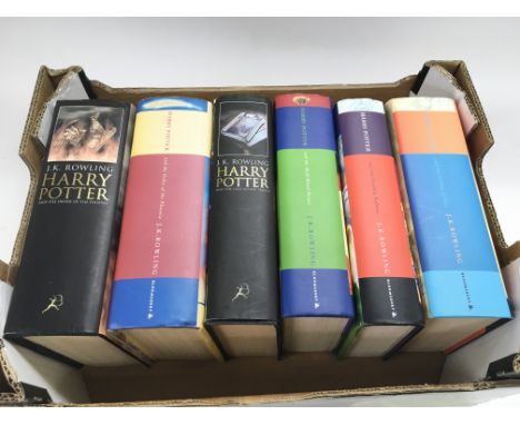 Six Harry Potter books, all first editions.