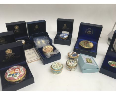 A collection of Royal Worcester Halcyon Days Ashley Copper porcelain and enamel boxes three without boxes (12)