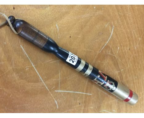A decorated police truncheon with crown and V R