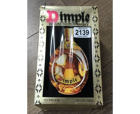A boxed bottle of Dimple DeLuxe Scotch Whisky