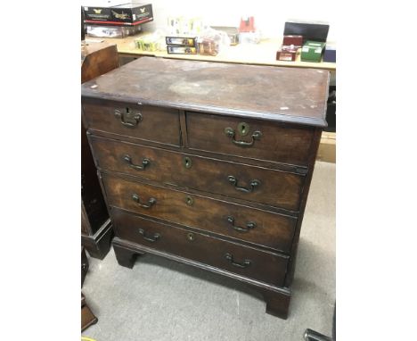 A George III mahogany chest fitted with two short drawers over three long and raised on bracket feet, approx 88cm x 51cm x 95