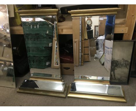Two console type mirrors.