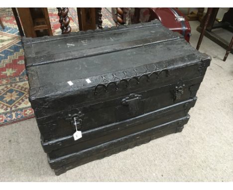 A vintage American travelling trunk with applied metal details and hinged clasp. Stamp to the interior reads 'Central trunk f