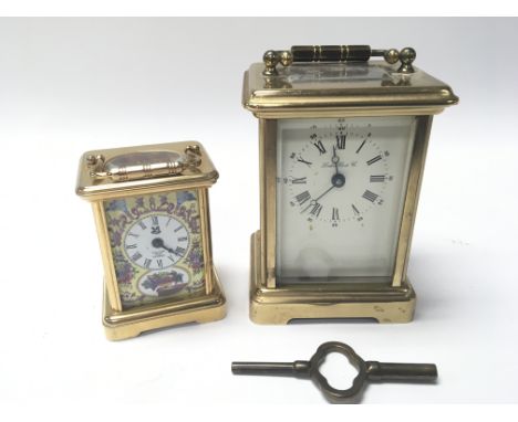 A Halcyon Days enamel small size carriage clock and a London Clock Co carriage clock (2)