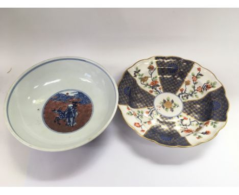 An Oriental bowl decorated with elders, approx diameter 22.5cm, together with a Royal Worcester scalloped bowl (2).