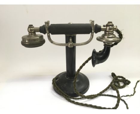 A vintage candlestick telephone by LM Ericsson Ltd.