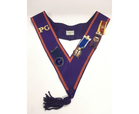 An Oddfellows sash and medals.