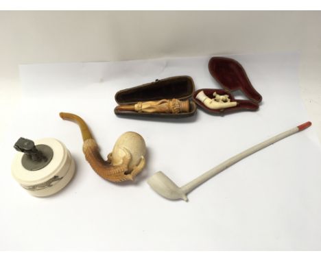 Mersham pipes and a lighter.