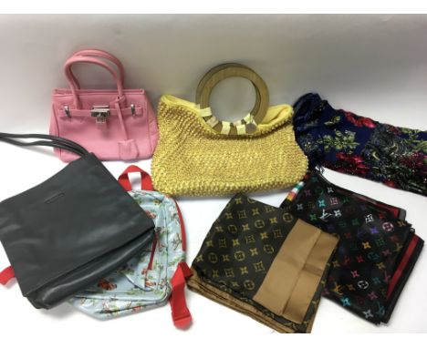 An interesting collection of three vintage handbags, two designer scarves , one embroidered Scarf, a bamboo handled umbrella 