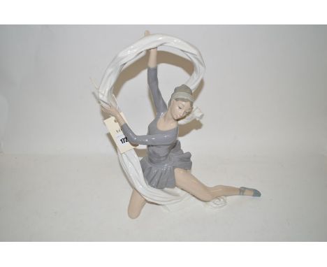 A Nao figure of a ballerina with ribbon.