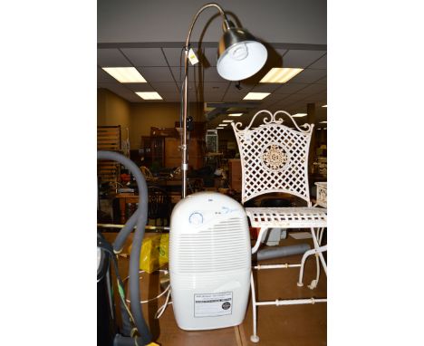 An Ebac 2400 dehumidifier; together with a standard lamp.