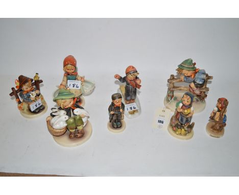Hummel figures for Goebel, to include: "Retreat To Safety", "Apple Tree Girl", a boy with rabbits, a girl with chickens and c